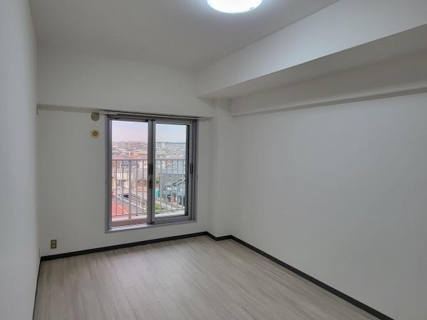 コープ野村南流山壱番街2号棟の洋室画像