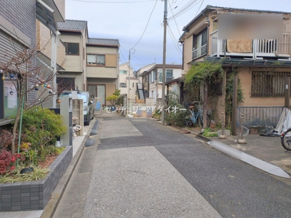 葛飾区高砂7丁目1号棟の前面道路含む現地写真画像