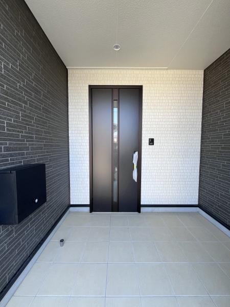 長与町三根郷第1　1号棟の玄関画像