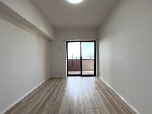 アプローズ長崎南ベイサイドヒルズ壱番館の洋室画像