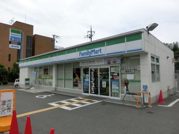 生駒市生駒台南の貸家のコンビニ画像